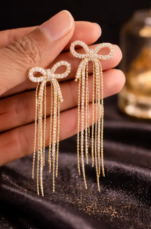Pavira Luxe Crystal Bow Tassel Earrings