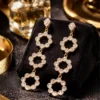 Pavira Luxe Triple Halo Zircon Drop Earrings