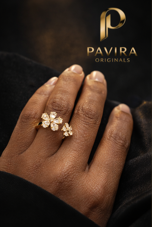 Gold diamond ring on black satin2 Pavira Blossom Dual Flower Ring